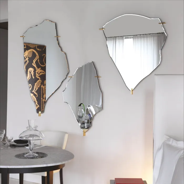 “Contemporary Archipelago bookcase by Driade featuring interconnected compartments and sculptural Italian craftsmanship”