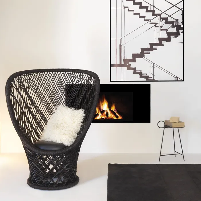 “Close-up of CARMINA chair by Driade – artistic Italian craftsmanship with smooth contours and luxury finish”
