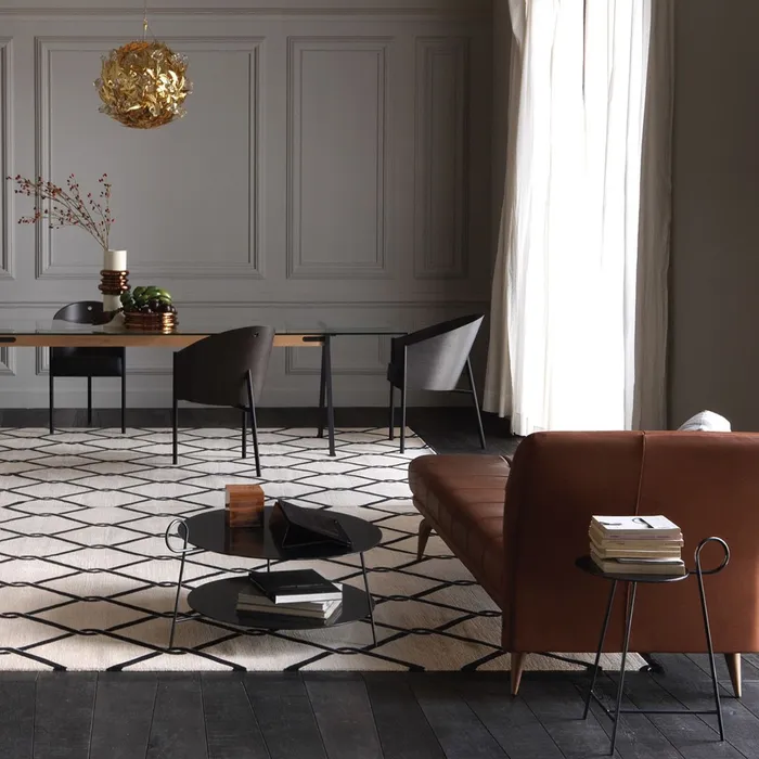 “Front angle of CARMINA by Driade – designer armchair showcasing refined craftsmanship and bold silhouette”
