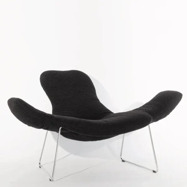 “Cocky Armchair by Driade – versatile seating with adjustable armrests, backrest, and headrest, upholstered in white faux fur with a gold base, offering customizable comfort and bold design by Sfera Ebbasta.”