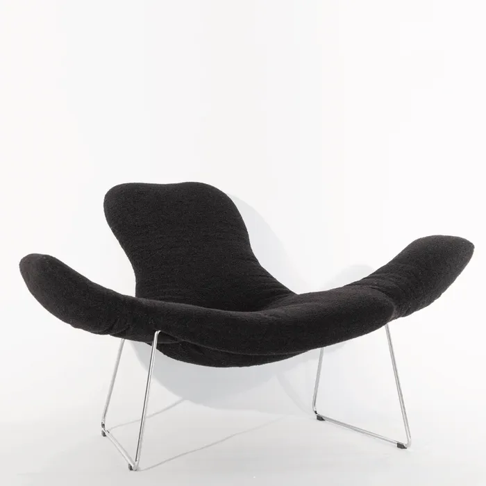“Cocky Armchair by Driade – versatile seating with adjustable armrests, backrest, and headrest, upholstered in white faux fur with a gold base, offering customizable comfort and bold design by Sfera Ebbasta.”