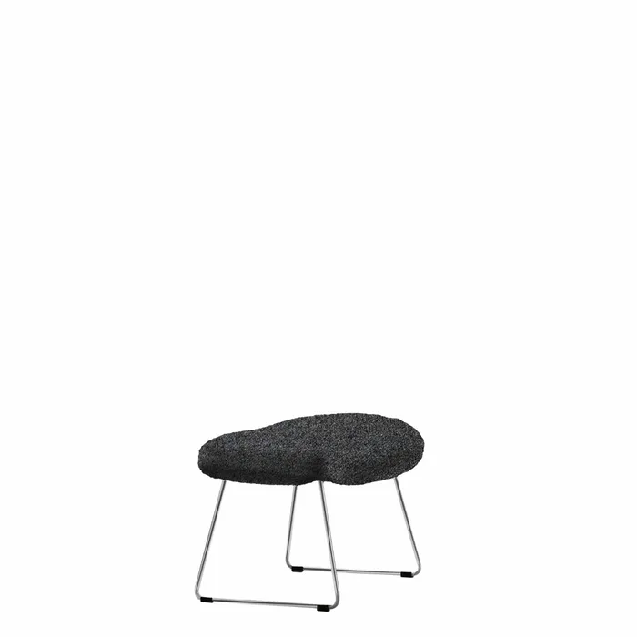 “Cocky Armchair by Driade – sculptural seating featuring long-haired white faux fur upholstery and a glossy gold claw-foot base, designed by Sfera Ebbasta, blending avant-garde aesthetics with luxurious comfort.”