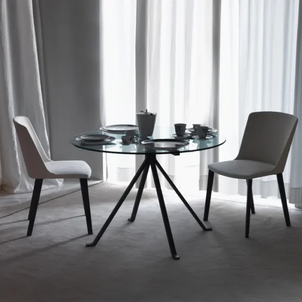 “CUGINO by Driade modern Italian designer chair – sleek metal frame with minimalist design and comfortable seating”