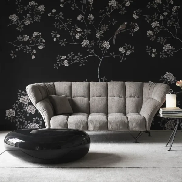 “33 Cuscini Sofa by Driade – contemporary sofa with 33 soft grey velvet cushions arranged in a grid pattern, set on a sleek black steel base, designed by Paolo Rizzatto, combining minimalist design with luxurious comfort.”