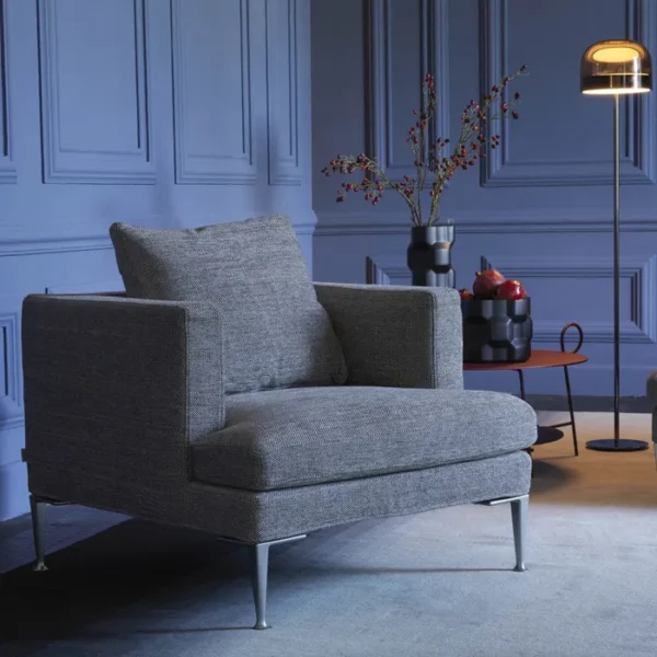 “LIRICA by Driade armchair – modern Italian design with suspended wooden frame and cast aluminum feet”
