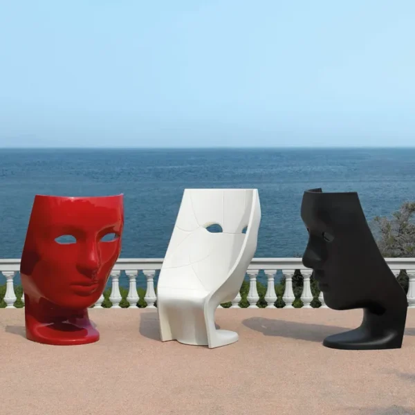 “Nemo Armchair by Driade – minimalist black polyethylene chair with classic facial features, offering a unique blend of art and functionality for contemporary spaces.”