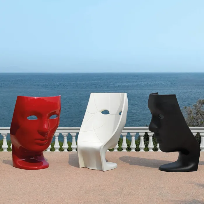 “Nemo Armchair by Driade – minimalist black polyethylene chair with classic facial features, offering a unique blend of art and functionality for contemporary spaces.”