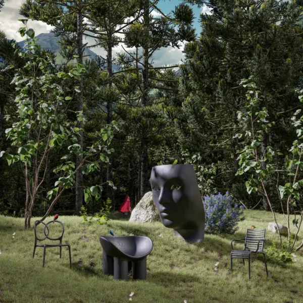 “Close-up of Nemo Green Armchair by Driade – detailed view of the minimalist face design, crafted from recycled polyethylene, highlighting its artistic and eco-friendly features.”