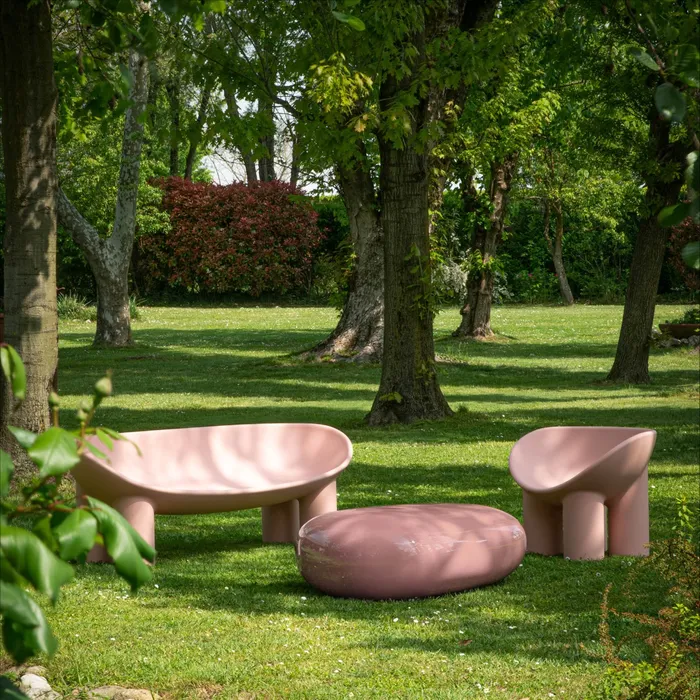 “Roly Poly Armchair by Driade – minimalist monobloc chair in Charcoal, featuring soft curves and cylindrical legs, suitable for indoor and outdoor use.”