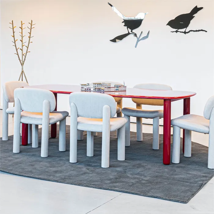 “Taylor Bird by Driade modern Italian designer chair with sleek minimalist silhouette and elegant curves”