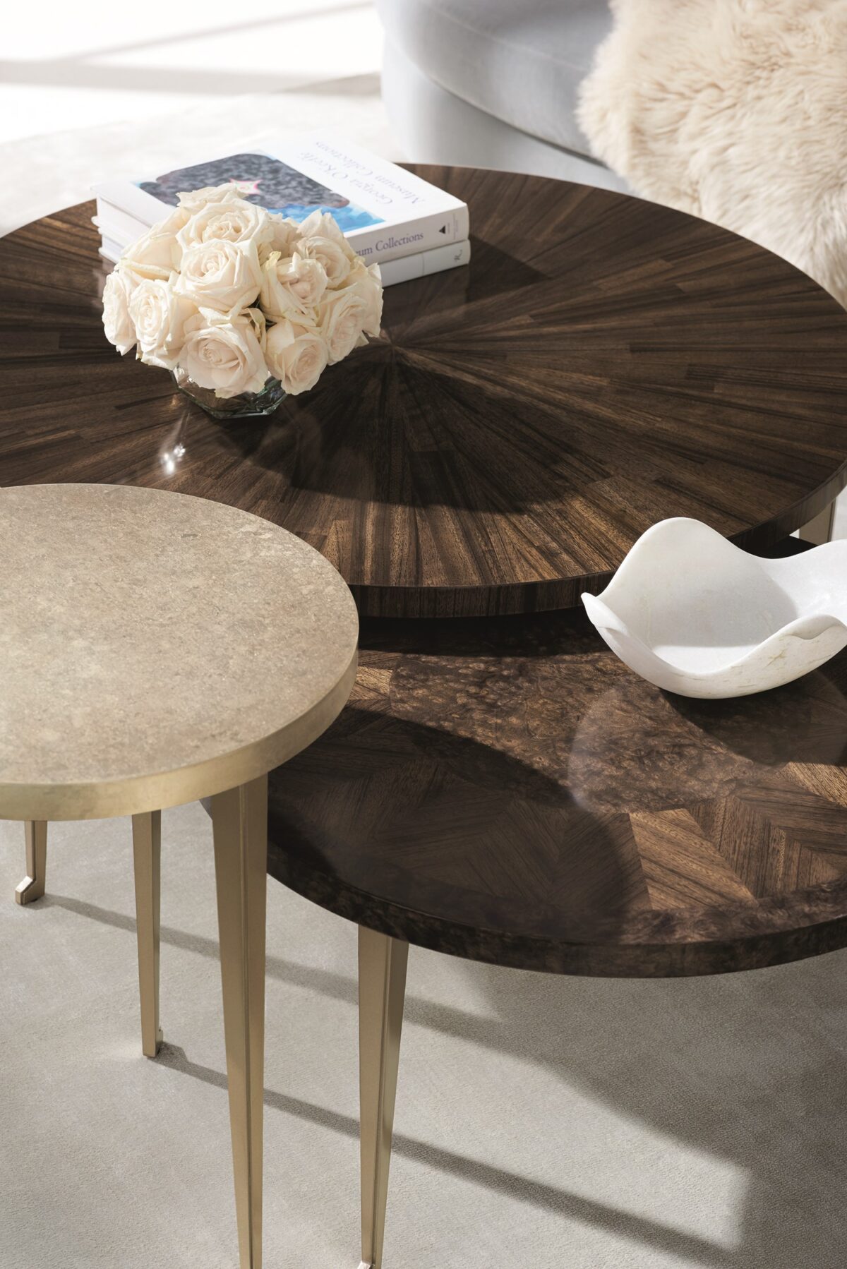 Sculptural side table featuring a warm golden finish and textured geometric pattern.