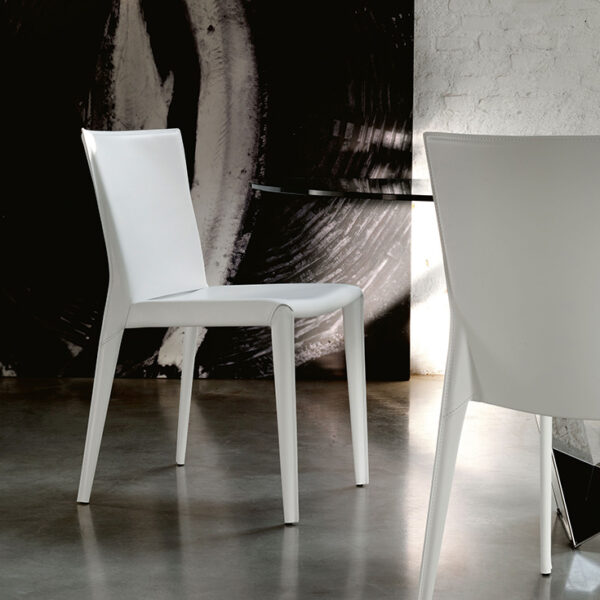 Close-up of Beverly chair by Cattelan – soft leather seat and streamlined steel legs