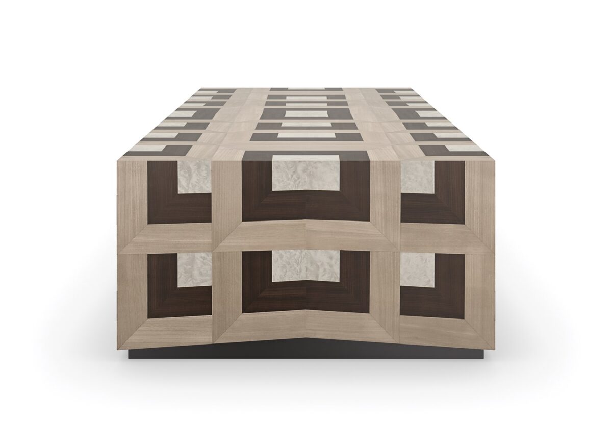Contemporary Caracole table with a minimalist mirrored finish and slim legs.
