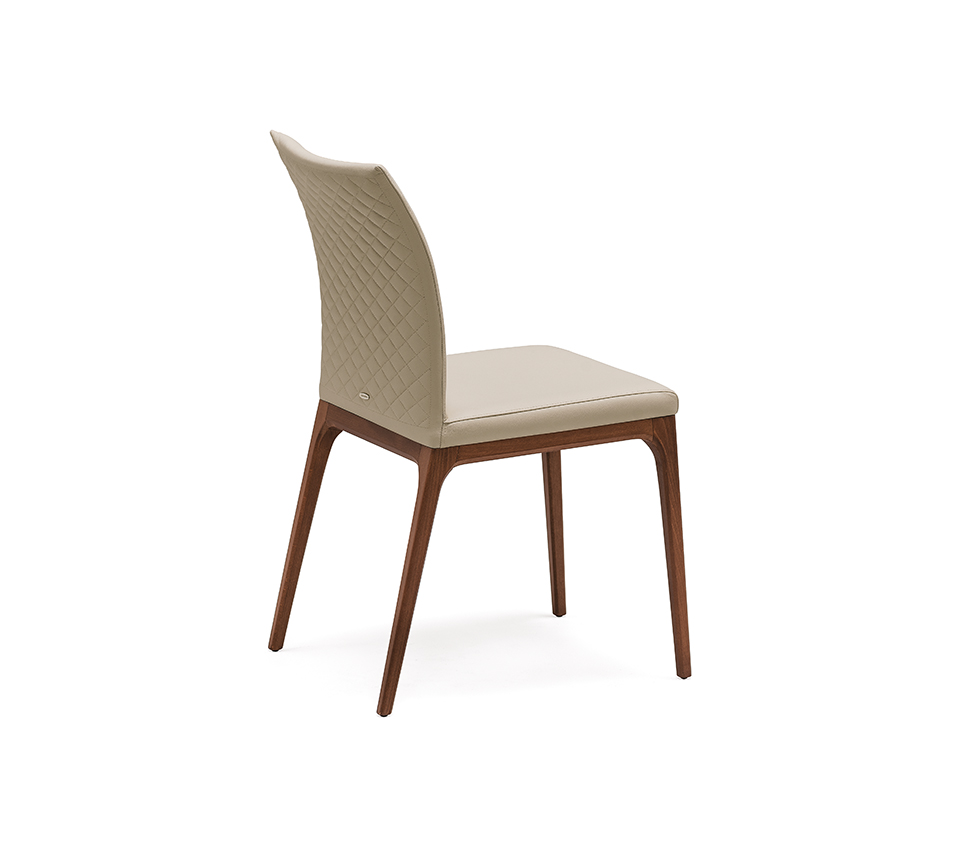 “ARCADIA Couture by Cattelan Italia – luxury dining chair with quilted backrest and elegant wooden legs”