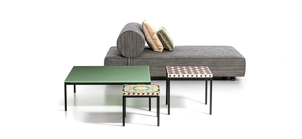 Nanà Table by Moroso showcasing Carrara marble top with steel frame at the Michigan Design Center