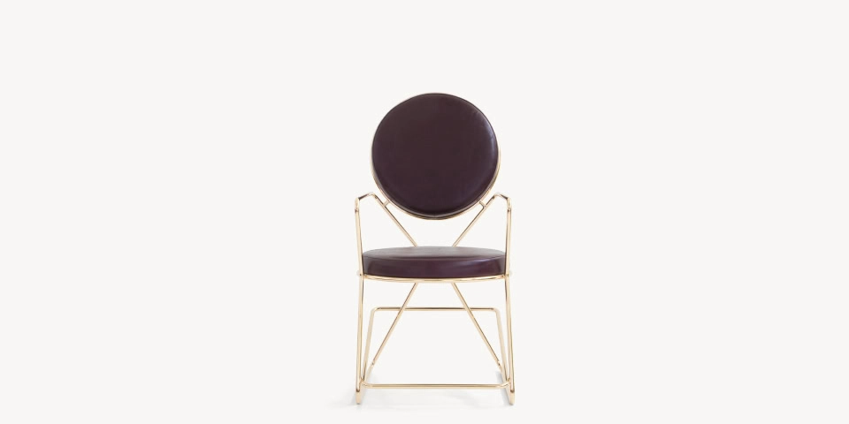 Double Zero by Moroso in bold sculptural Italian upholstery with dual circular forms, front view in a Royal Oak Michigan showroom