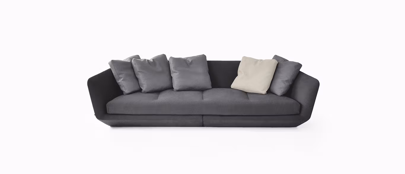 Aura by Bensen sofa in soft beige fabric with deep seat cushions and relaxed silhouette in a modern living room