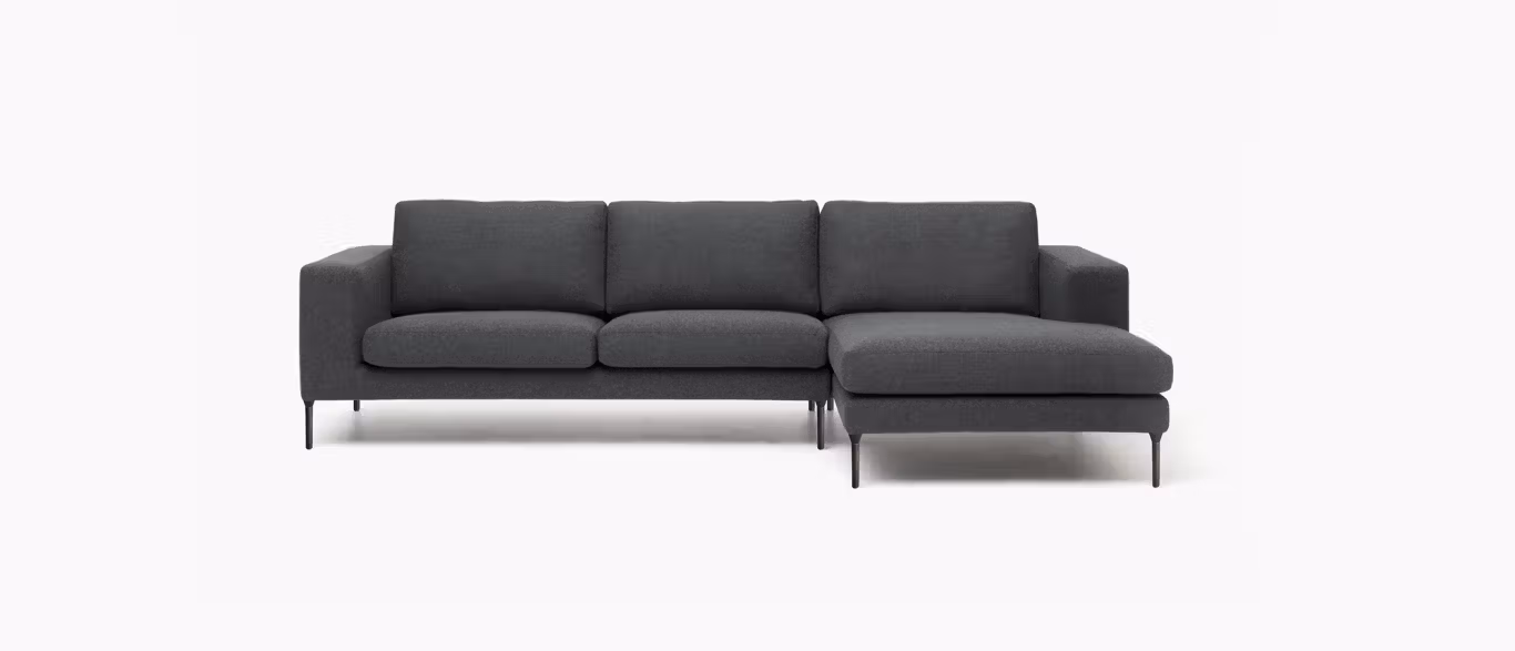 Neo Sectional by Bensen in soft gray fabric with clean lines and low-profile design in a contemporary living room