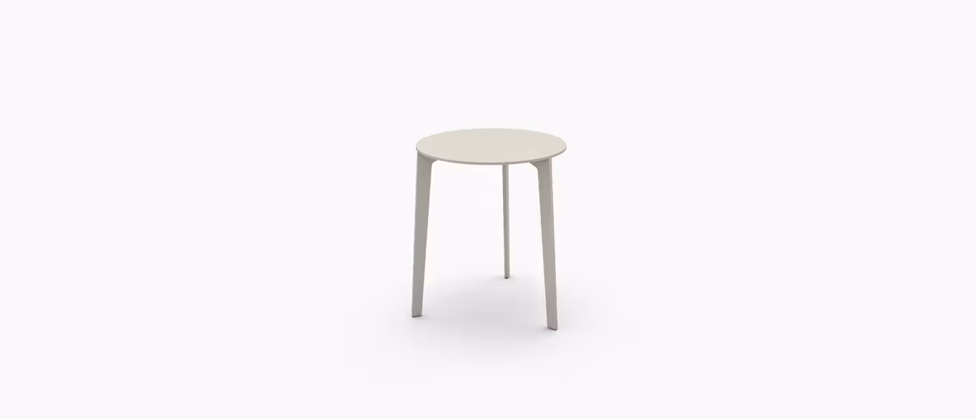"Outdoor Side Table by Bensen with round Polaris laminate top and sand-gray aluminum legs"