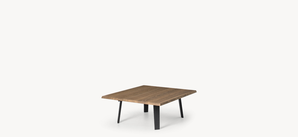Il Naturale Coffee Table by Moroso rear angle emphasizing precision joinery of naturally dried oak top and base in a Royal Oak Michigan display