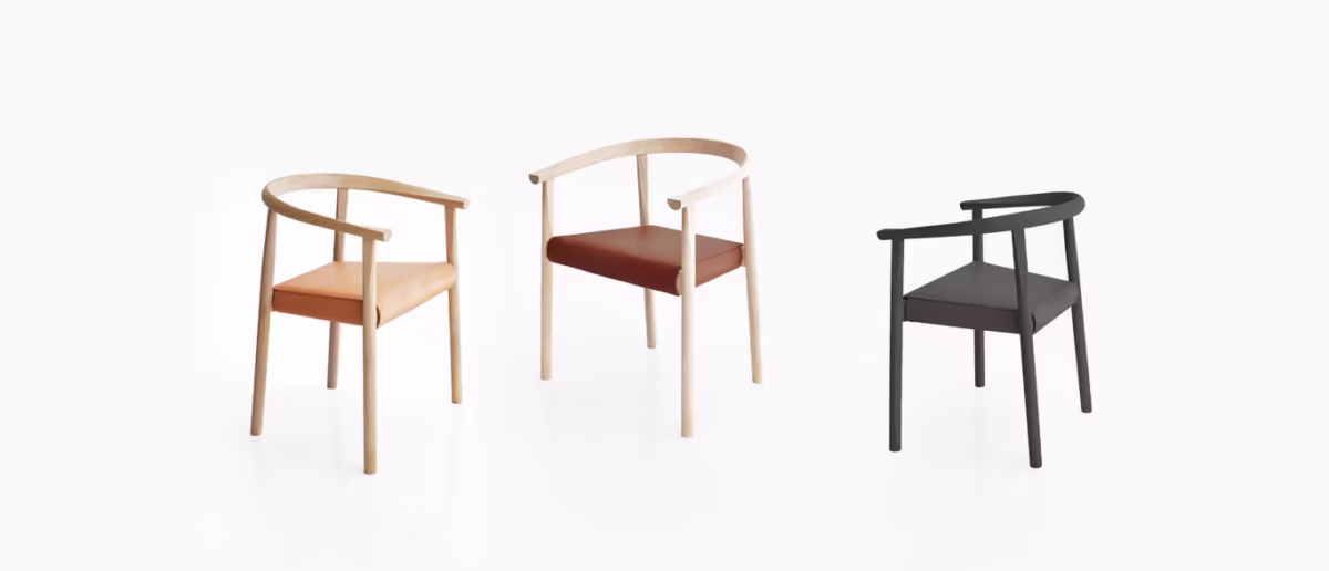 Tokyo chair by Bensen with curved wood frame and leather seat