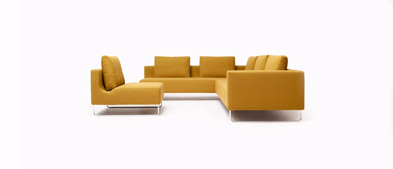 Canyon by Bensen modular sofa in soft gray fabric with wide, deep seats and low armrests in a modern living room