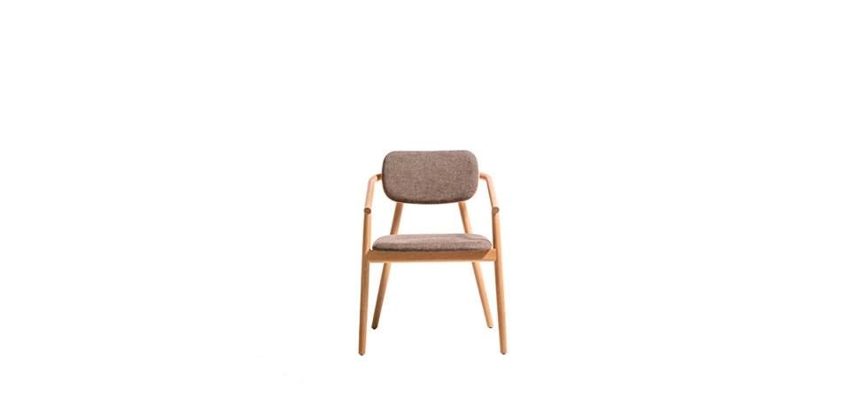 Klara by Moroso in contemporary Italian fabric, front view in a Royal Oak Michigan showroom