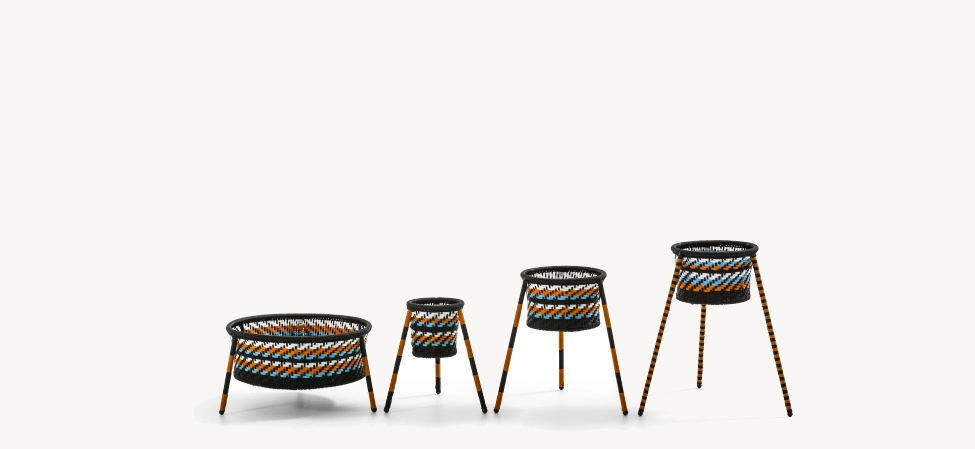 Hanging Garden by Moroso featuring delicate suspended ceramic planters with lush green foliage