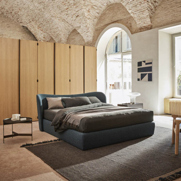“Embrace by Pianca modern Italian armchair – curved silhouette with luxurious upholstery”
