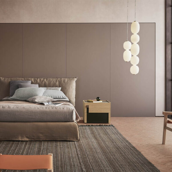 “Piumotto bed by Pianca – modern Italian upholstered bed with soft padded frame and plush headboard”