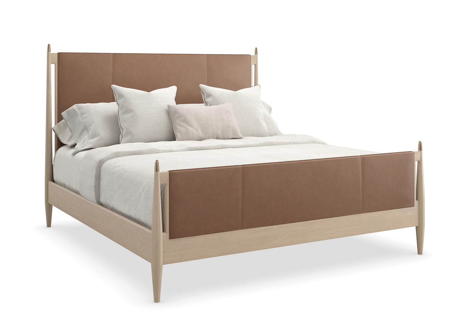Caracole Rhythm King Bed featuring a luxurious camel-colored leather upholstered headboard and footboard, complemented by a Sun Drenched Oak wood frame with metal finials in Lucent Bronze finish, designed with clean, parsons-style lines.