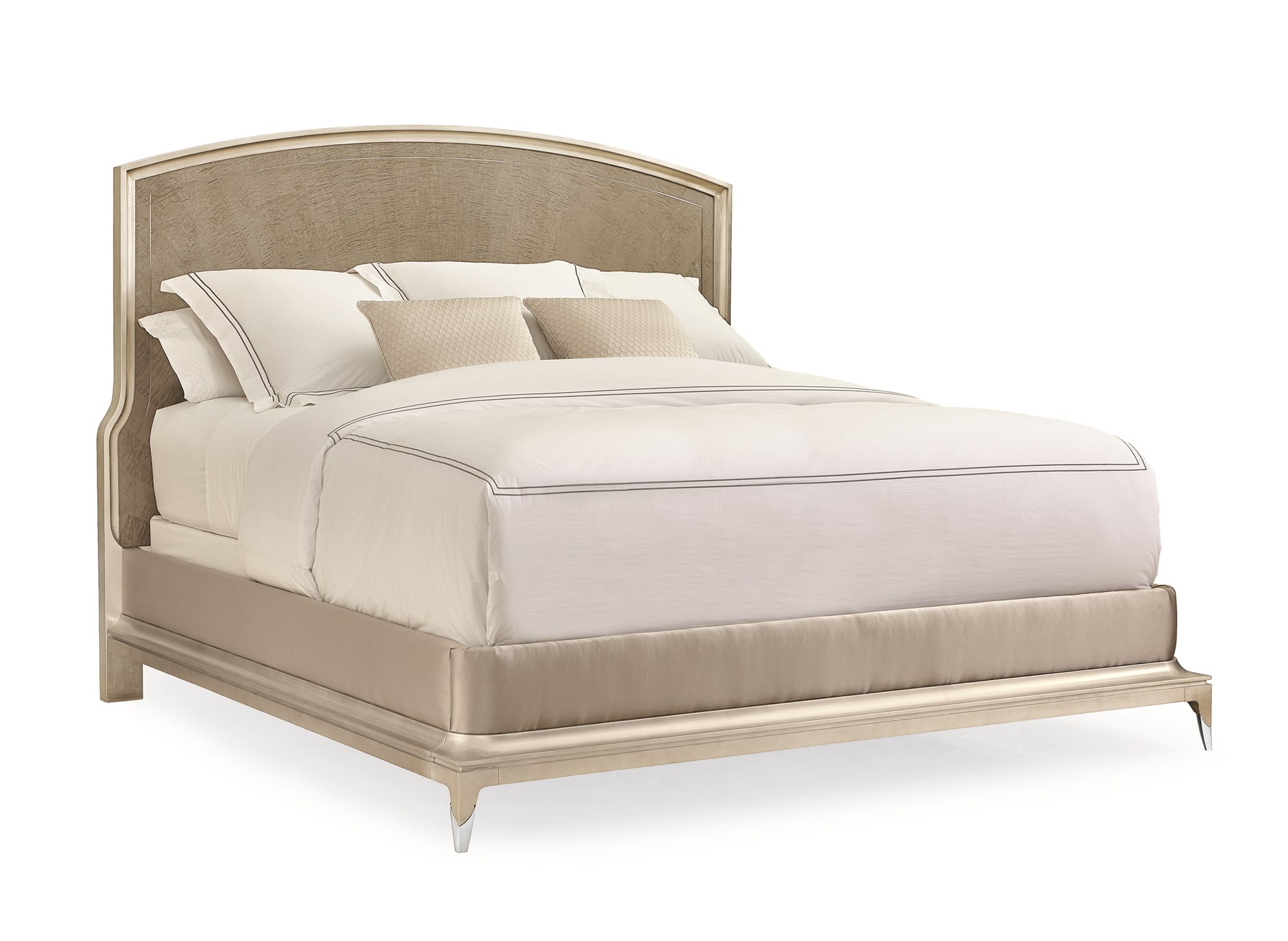 Caracole Rise To The Occasion King Bed featuring a gracefully curved headboard outlined with a metal inlay, crafted from Silver Curly Maple veneers in a Soft Silver Leaf finish, complemented by a Moonlit Sand frame and Lightly Brushed Chrome metal ferrules on the legs.