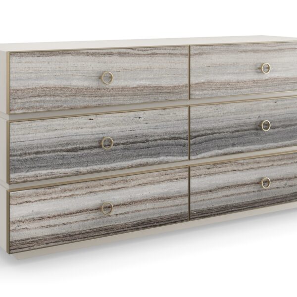Modern dresser with a textured, layered facade and a sleek, low-profile design, BEDROCK Dresser by Caracole.