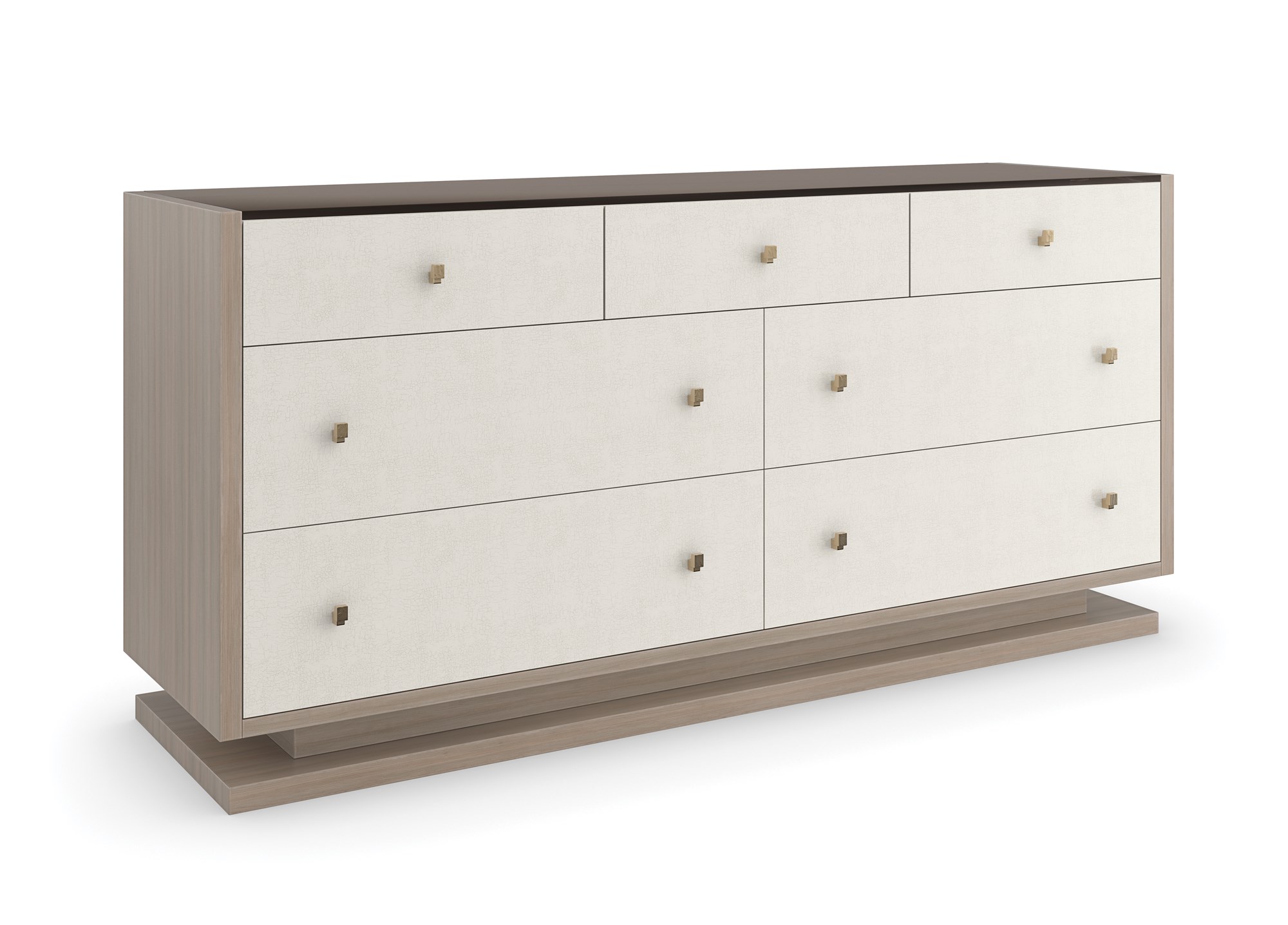Caracole Calypso seven‑drawer dresser in Ivory Craze with Dry Martini base and brushed gold textured hardware.