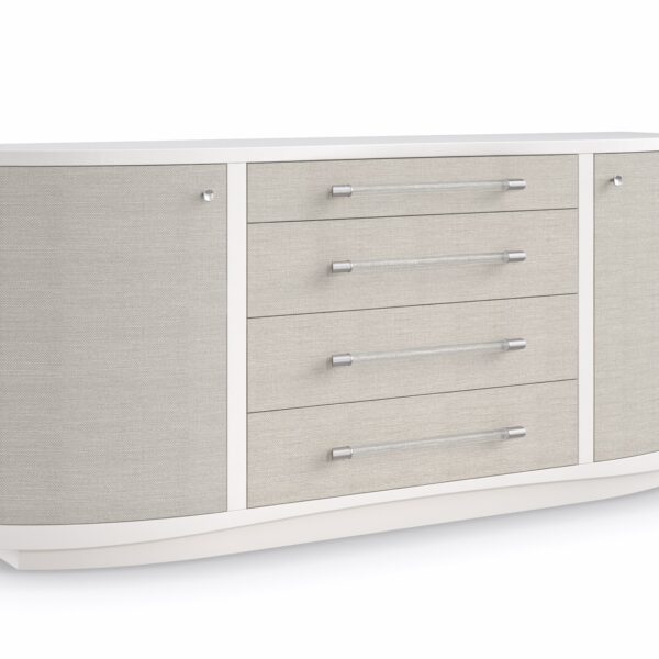 Angled shot showing the dresser’s rounded ends and seamless transition from ash veneer case to woven raffia drawer fronts.