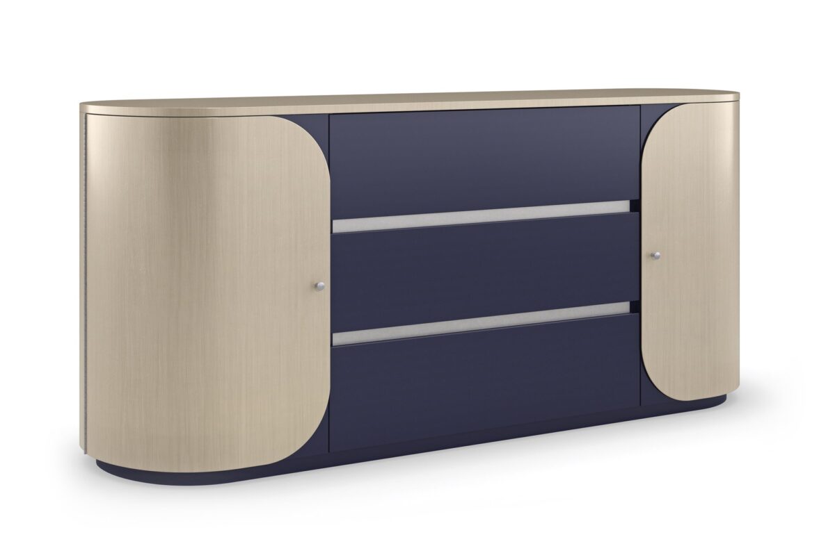 Da Vita Dresser by Caracole with three center drawers in Prussian Blue and curved side doors in Thunder finish, featuring a soft oval silhouette and sleek modern design.