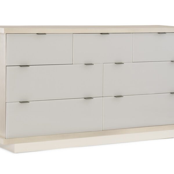 Expressions Dresser by Caracole — a 66″‑wide contemporary dresser with seven back‑painted glass drawer fronts in delicate gray, set within an ash‑taupe hardwood case, featuring notched-tab pulls, soft‑close undermount guides, a low plinth base, and USB ports integrated on both sides.