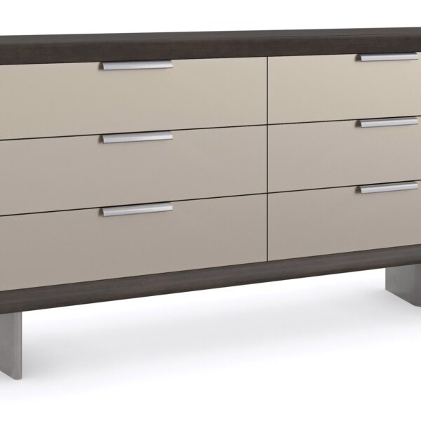 Fashion Dresser by Caracole — a curving six-drawer dresser in lustrous gold-leaf finish, topped with a mirrored bronze surface and slender tapered legs; each drawer features jewelry-like ring pulls and undermount soft-close operation.