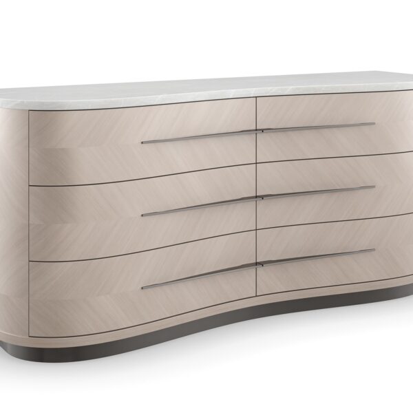 Roam Dresser by Caracole — a sleek 68″‑wide dresser in pearlescent Moonstone finish with six gently curved soft‑close drawers featuring horizontal Deep Bronze handles; chevron‑patterned Koto veneers flow organically across the fronts and end panels, topped with luxurious white Rhino marble and set atop a Seal‑Skin tone plinth base.