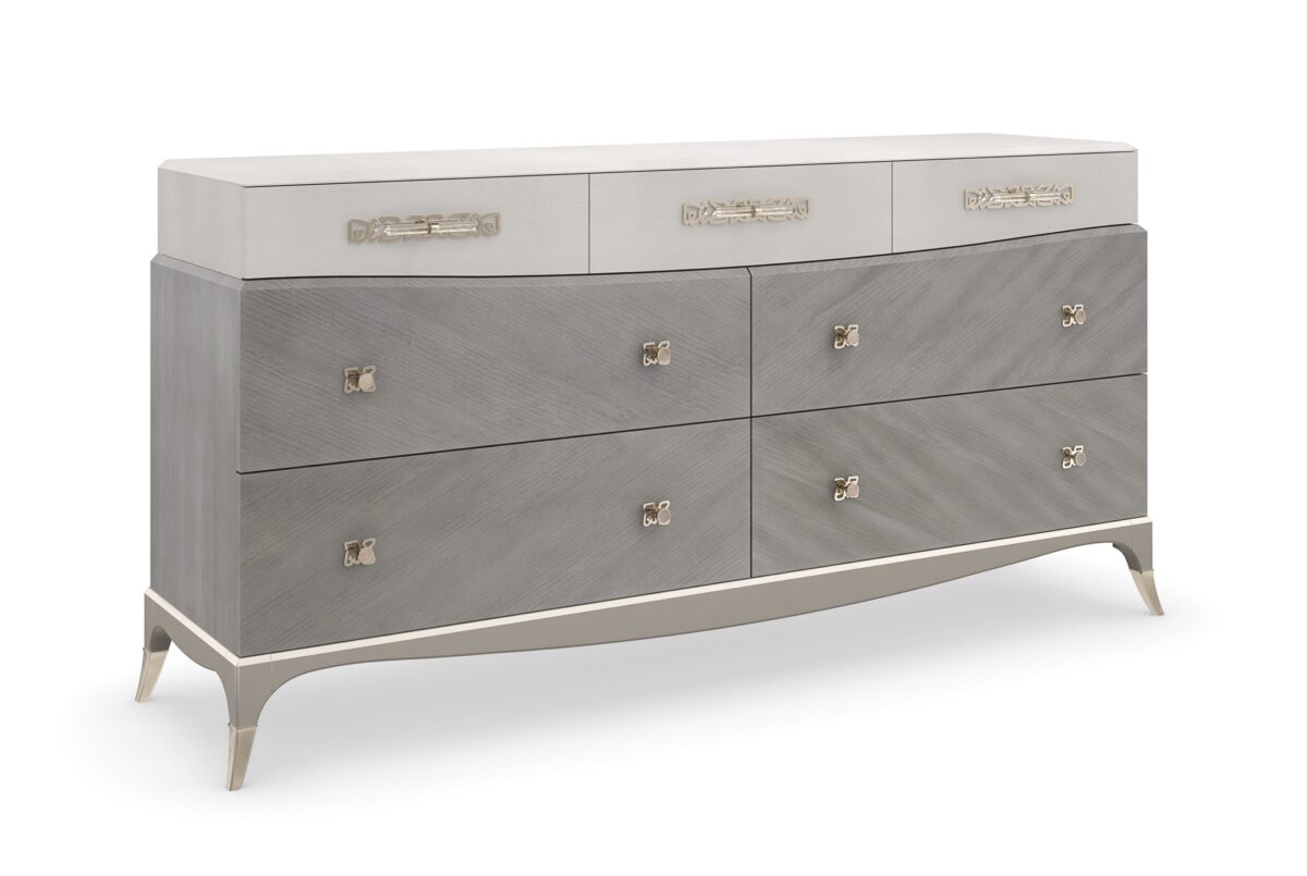 Tempo Dresser by Caracole — a 72″×36″ sculptural dresser topped with Alabaster‑painted faux shagreen, set above a Cappuccino‑finished Coffee Platano veneer case, featuring three shagreen‑front top drawers (outer ones felt‑lined, left with removable jewel tray), four lower Cappuccino drawers, bespoke ceramic‑inset hardware against Whisper‑of‑Gold backplates, outward‑curving legs with metal ferrules, and a Sparkling Argent base.