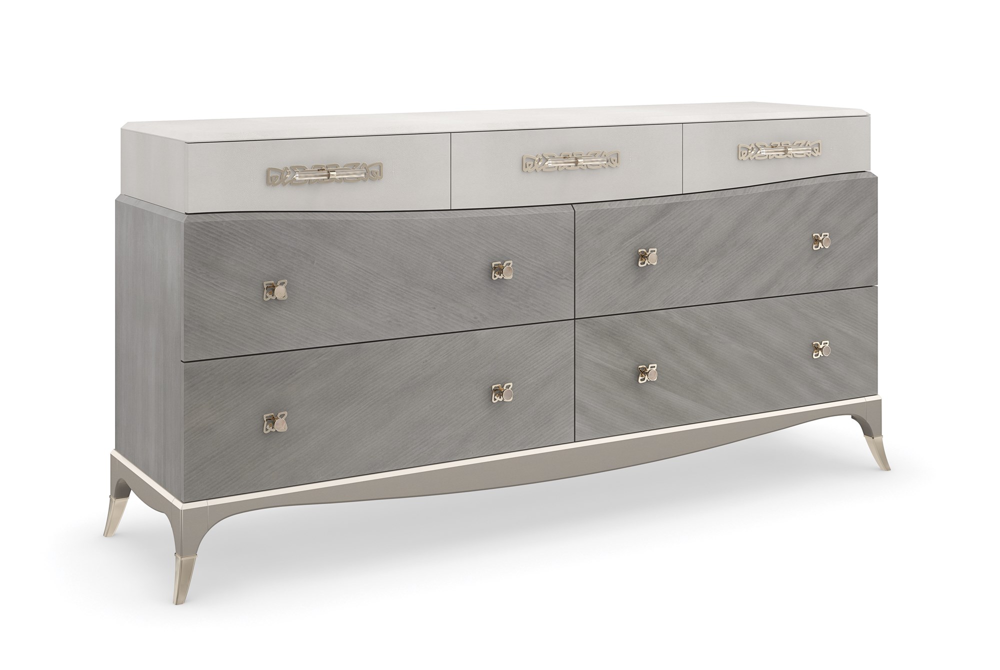 Tempo Dresser by Caracole — a 72″×36″ sculptural dresser topped with Alabaster‑painted faux shagreen, set above a Cappuccino‑finished Coffee Platano veneer case, featuring three shagreen‑front top drawers (outer ones felt‑lined, left with removable jewel tray), four lower Cappuccino drawers, bespoke ceramic‑inset hardware against Whisper‑of‑Gold backplates, outward‑curving legs with metal ferrules, and a Sparkling Argent base.
