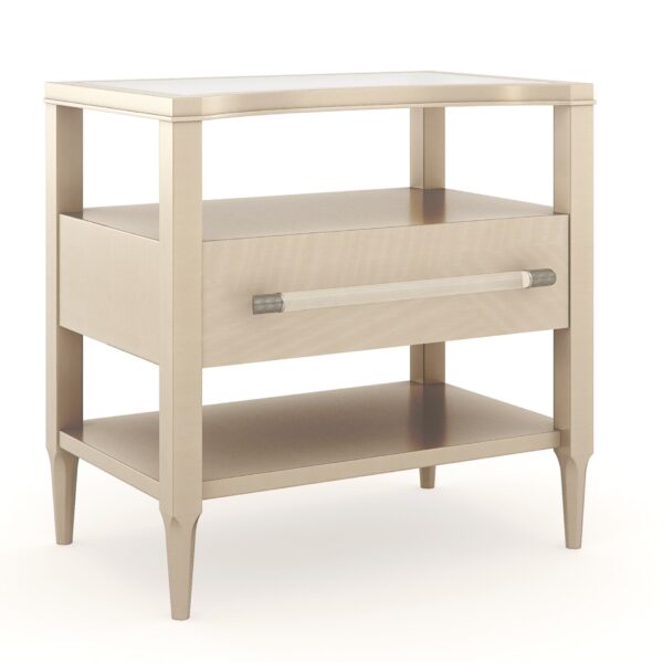 Clearly Open Nightstand by Caracole — a 24″‑wide modern nightstand featuring a frosted glass top with a crescent-shaped curve, supported by a Champagne Pearl–finished base. It includes a single soft-close drawer with a Natural Glow wood front, open storage above and below, and a clear acrylic pull rod capped in Satin Nickel.