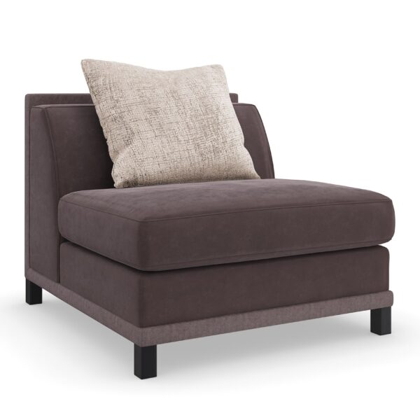 The Tuxedo Armless Chair by Caracole (SKU: UPH-423-AS1-A) is a sophisticated and versatile piece from the Caracole Upholstery collection. Designed as part of a modular sectional, it offers both style and functionality, making it an excellent choice for modern living spaces.