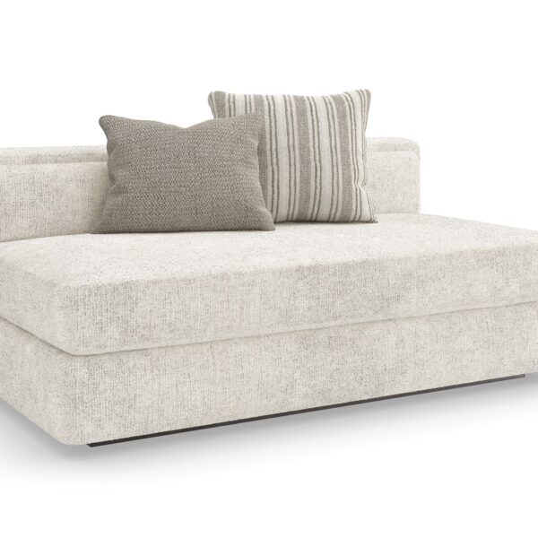 The Unity Armless Loveseat by Caracole (model M140-022-AL1-A) is a refined modular piece from the Caracole Modern Principles collection. It embodies a modern European aesthetic, characterized by clean lines, organic textures, and a harmonious blend of materials.