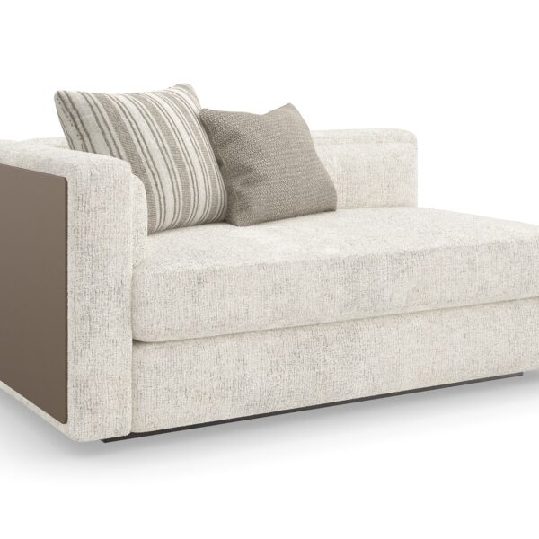 The Unity Left Arm Loveseat by Caracole (model M140-022-LL1-A) is a refined modular piece from the Caracole Modern Principles collection. It embodies a modern European aesthetic, characterized by clean lines, organic tones, and a harmonious blend of textures.