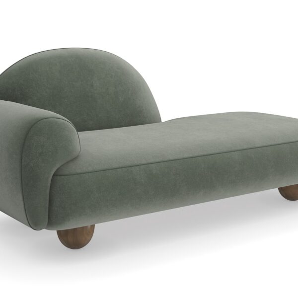 The Cypress Chaise by Caracole (model M150-023-071-A) is a luxurious, Memphis-inspired piece that combines sculptural elegance with plush comfort. Its cloud-like silhouette and rich verdigris mohair-velvet upholstery make it a standout addition to any interior.