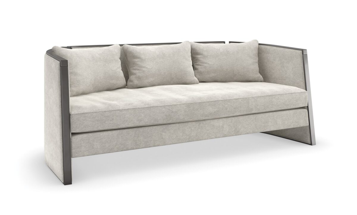 "Chic and contemporary Cut Away Sofa by Caracole, offering a striking design with clean lines and luxurious seating for a modern living space."