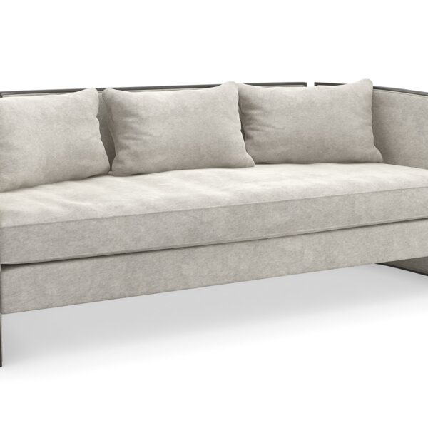 "Chic and contemporary Cut Away Sofa by Caracole, offering a striking design with clean lines and luxurious seating for a modern living space."