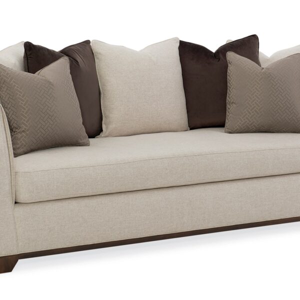 "Sleek and sophisticated Moderne Sofa by Caracole, featuring clean lines and luxurious upholstery, perfect for adding a modern touch to any living room."