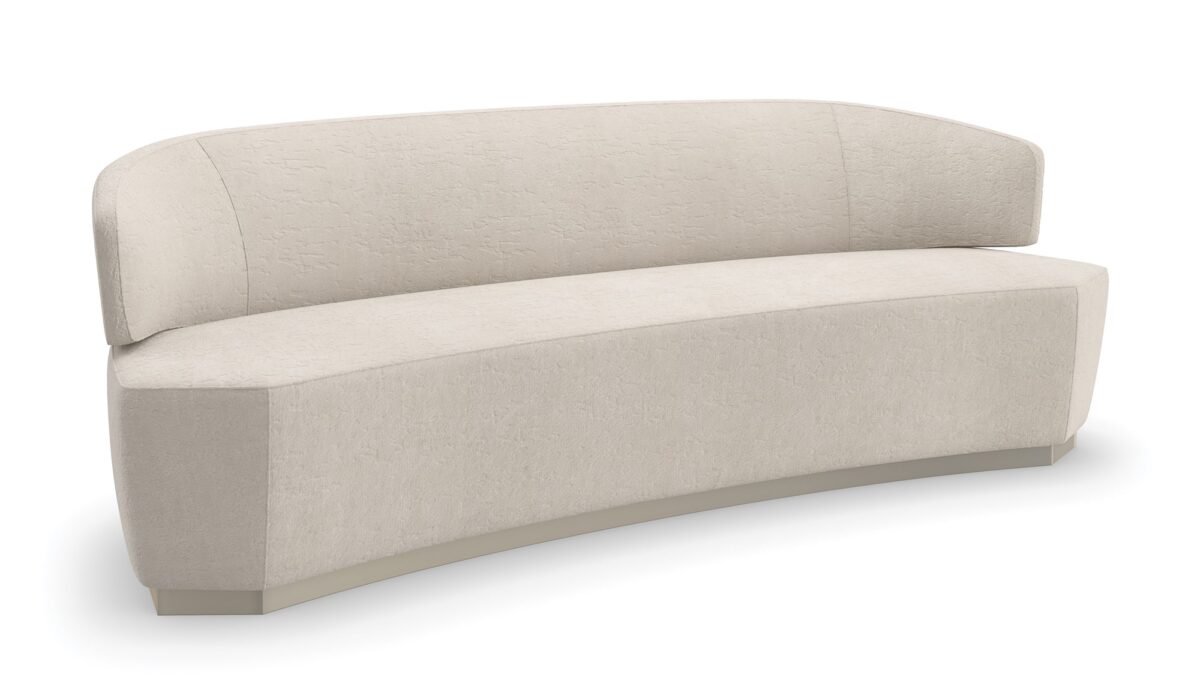 "Elegant and refined Olympia Sofa by Caracole, featuring plush upholstery and a contemporary design that adds timeless sophistication and comfort to any space."
